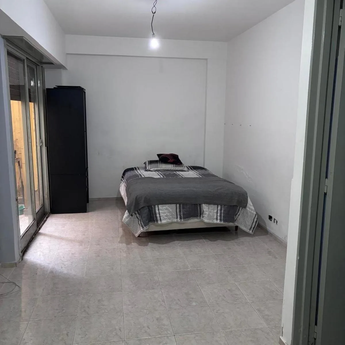 Monoambiente en planta baja con patio