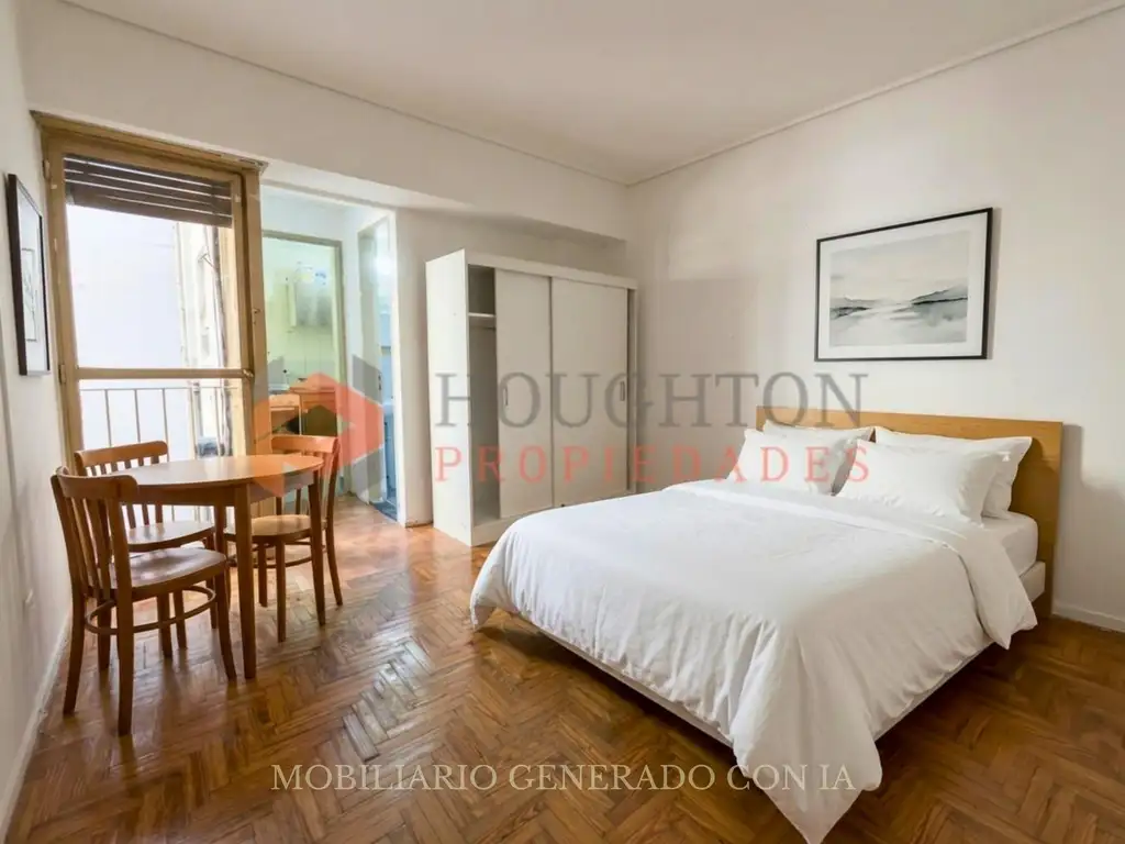 Monoambiente con balcón francés