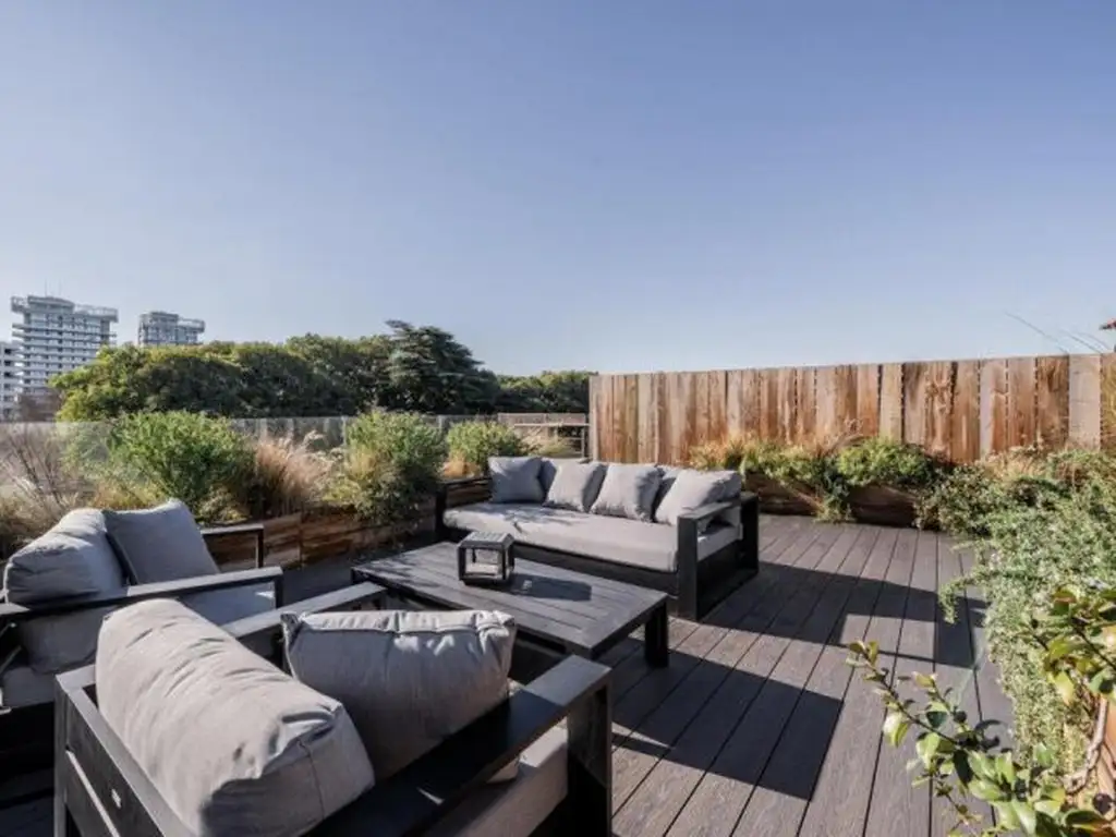Tríplex con terraza y cocheras