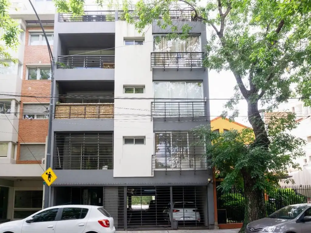 Monoambiente con balcón corrido