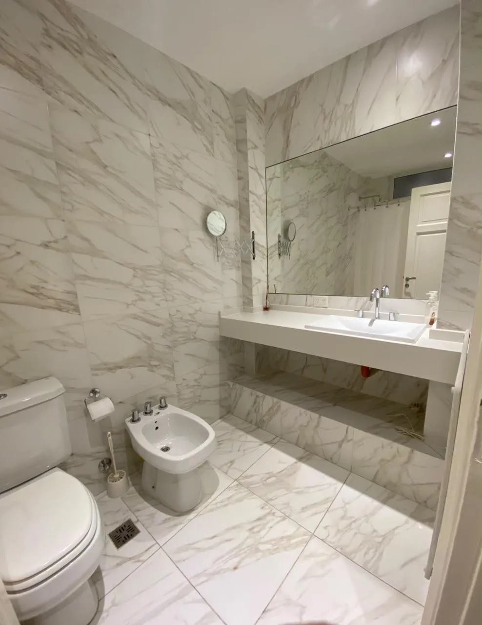 Renovated bathroom with glass shower