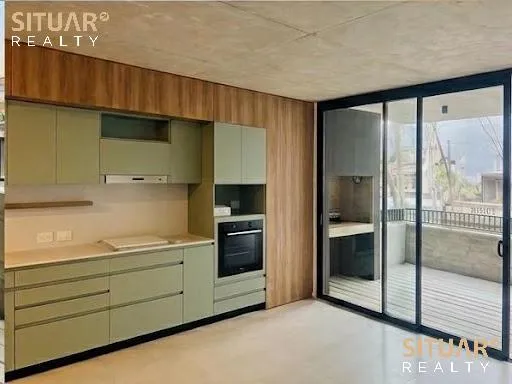Departamento con doble balcón