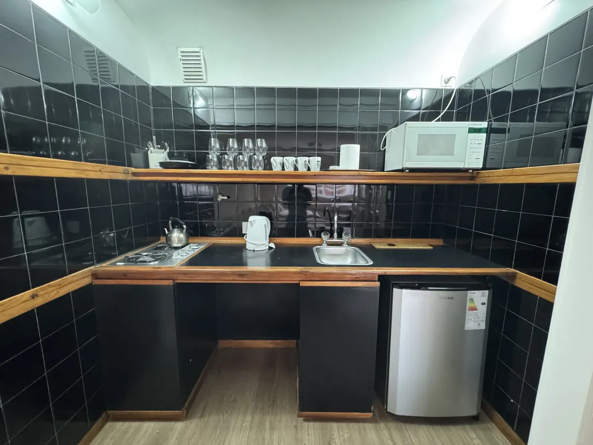 Studio reciclado con piscina