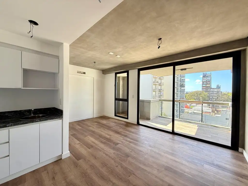 Departamento con balcón y amenities