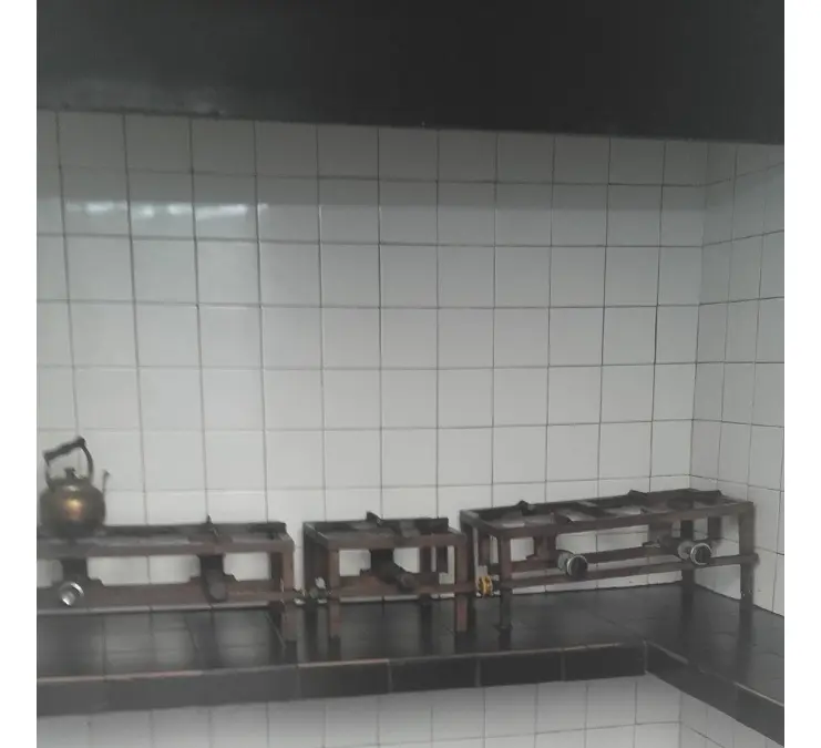 Furnished room with shared bathroom and kitchen