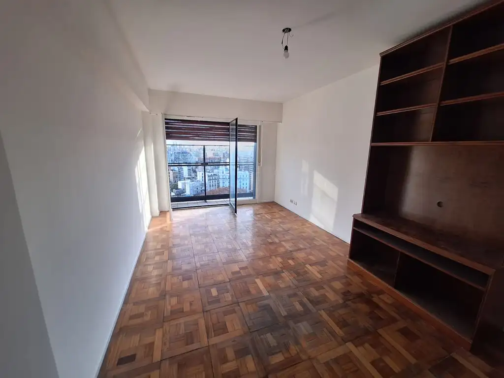 Departamento en piso 20 con balcón